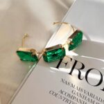 Bracelete Folheado Dourado Trio de Pedras de Chaton Verde Esmeralda
